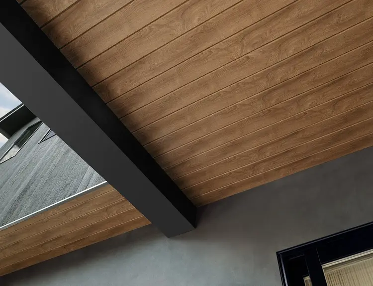 AZEK Exteriors Alpine Trim creates. a real wood look on the ceiling