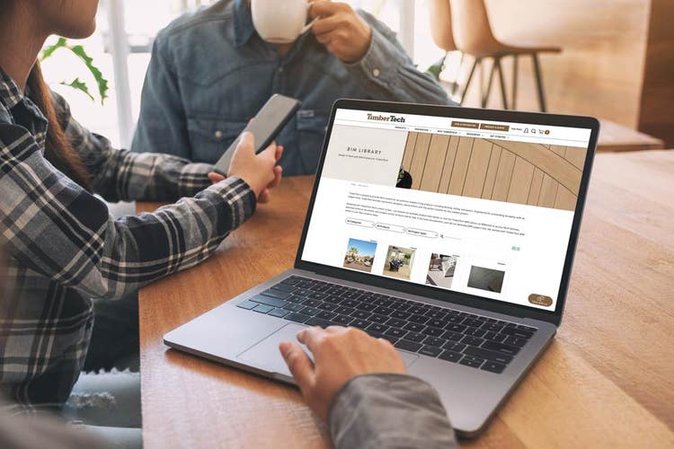 person viewing TimberTech website on their computer