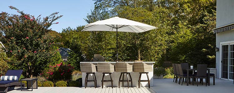 Backyard inspiration pool bar on South Hamptons deck made from TimberTech PRO Legacy Collection in Whitewash Cedar