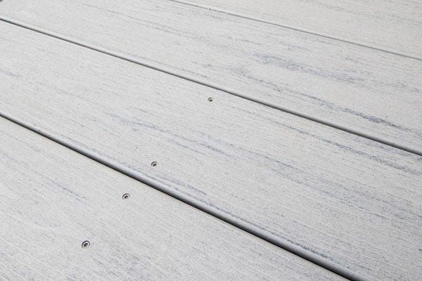 Close up of Silver Maple decking installed with TOPLoc color-matched screws