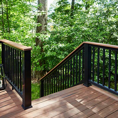 A deck stairs design may require an entryway and walkway