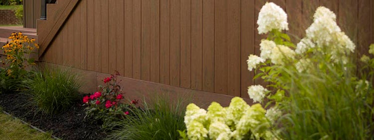 TimberTech PRO Terrain Collection in Brown Oak with native plants