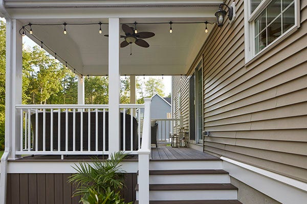 Modern deck designs with a covered deck feature