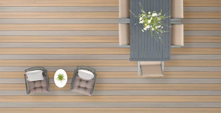 Two toned aerial view of their TimberTech deck with alternating gray and light brown deck boards