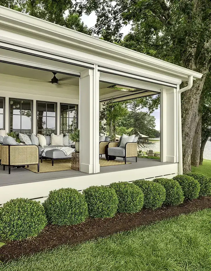 Covered open air patio with outdoor furniture
