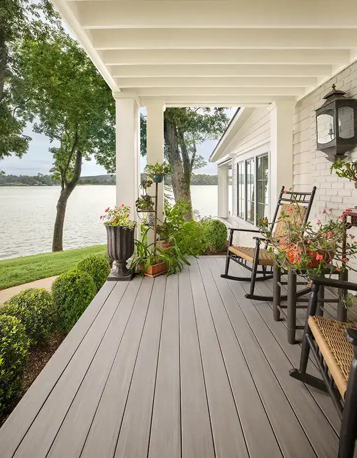 View of front porch that shows house is right on a lake