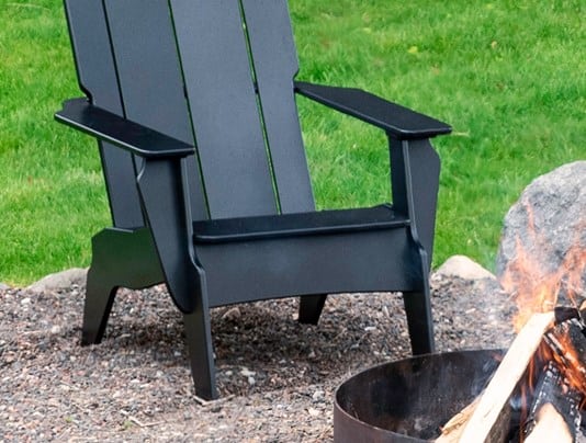 Black Loll chair in front of fire pit