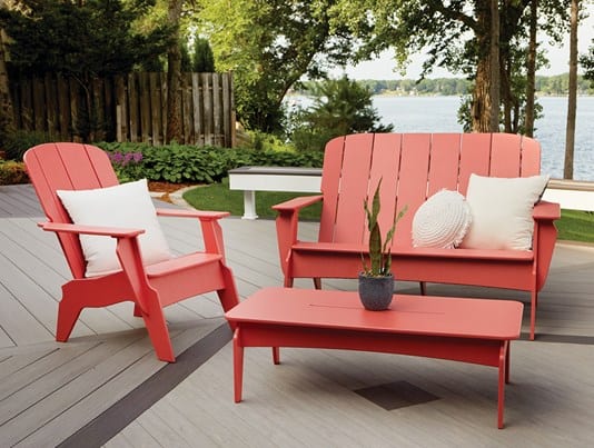 Outdoor Furniture TimberTech Invite Collection by Loll coral set in on lakeside deck