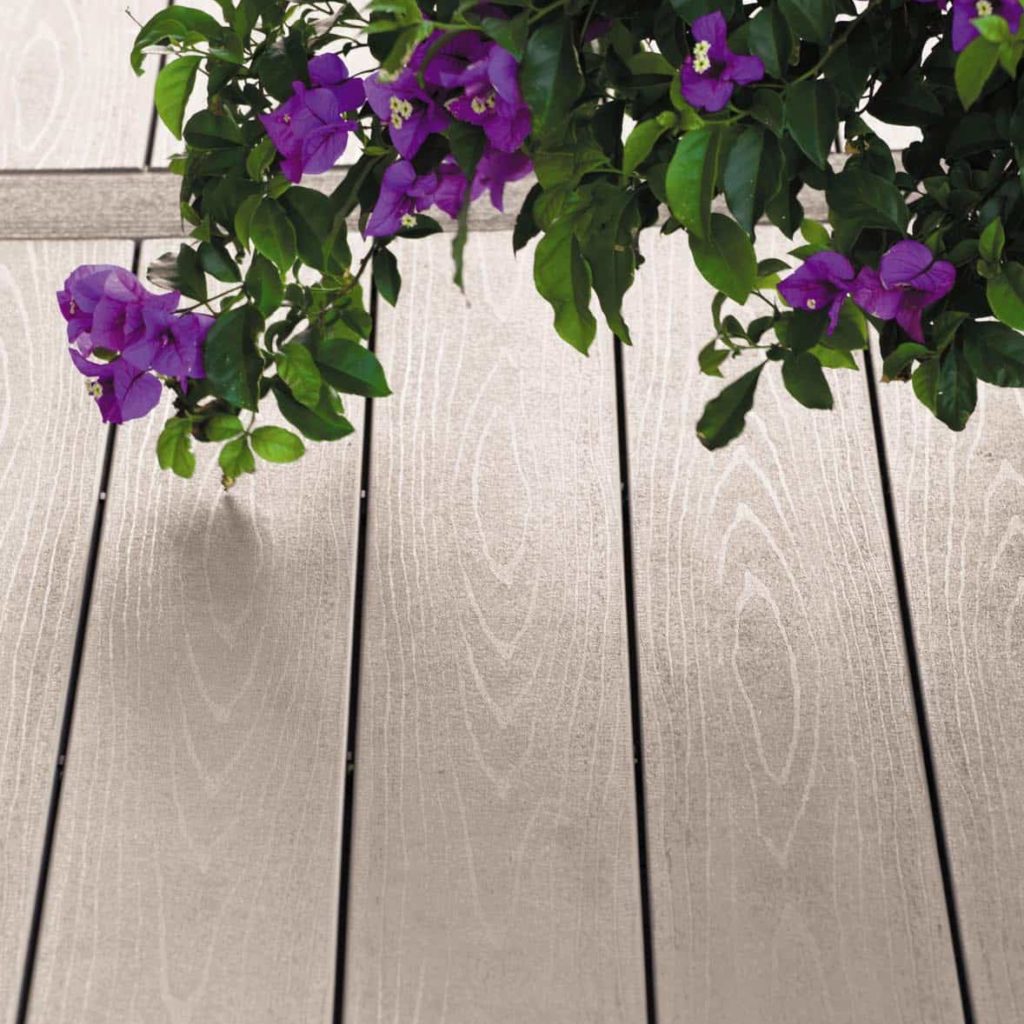 Closer look at TimberTech PRO Terrain Collection in Sandy birch with purple flowers