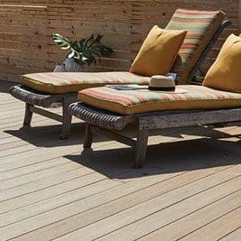 vintage-weathered-teak-2621 Deck featuring TimberTech AZEK Vintage Collection in Weathered Teak with outdoor chairs