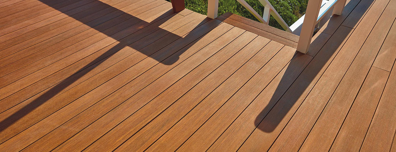 Replacing Wood Deck Boards With Composite Featuring TimberTech AZEK Vintage Collection in Mahogany