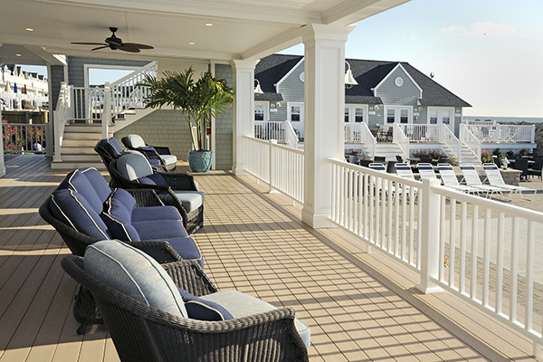 Deck styles for coastal homes featuring TimberTech AZEK Harvest Collection in Brownstone