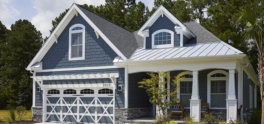 Outdoor living space plans for Craftsman-style home featuring AZEK Siding & Trim