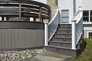 Deck stairs featuring TimberTech AZEK Vintage Collection in Coastline & Mahogany capped polymer decking