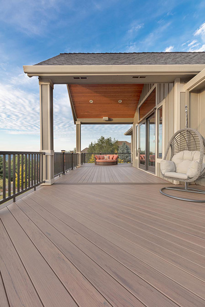 sustainable composite decking featuring TimberTech PRO Legacy in Tigerwood and Mocha
