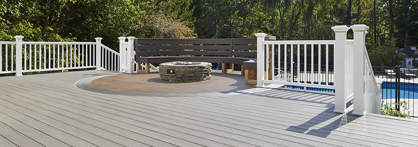A design-your-own-deck finished project made from TimberTech AZEK Vintage Collection in Coastline, Mahogany, Dark Hicory