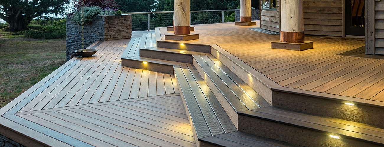 Design your own deck like a pro featuring TimberTech PRO Legacy Tigerwood deck, stairs, & TimberTech deck lights