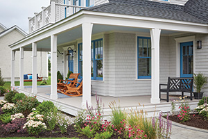 Front porch project featuring TimberTech AZEK Harvest Collection in Slate Gray with rocking chairs