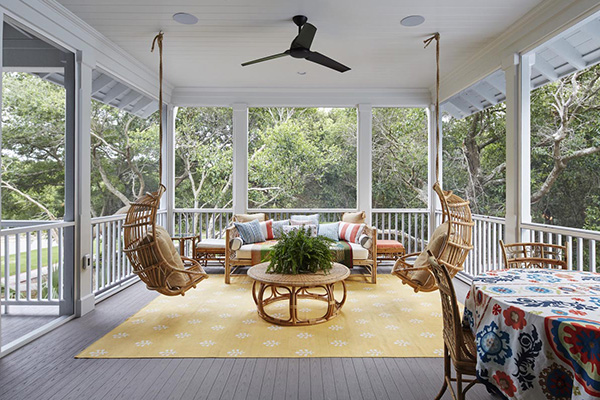 Outdoor family room screened porch featuring TimberTech AZEK Harvest Collection Slate Gray with outdoor furniture