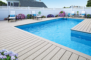 Best composite decking for full sun poolside deck made from TimberTech AZEK Harvest Collection Slate Gray