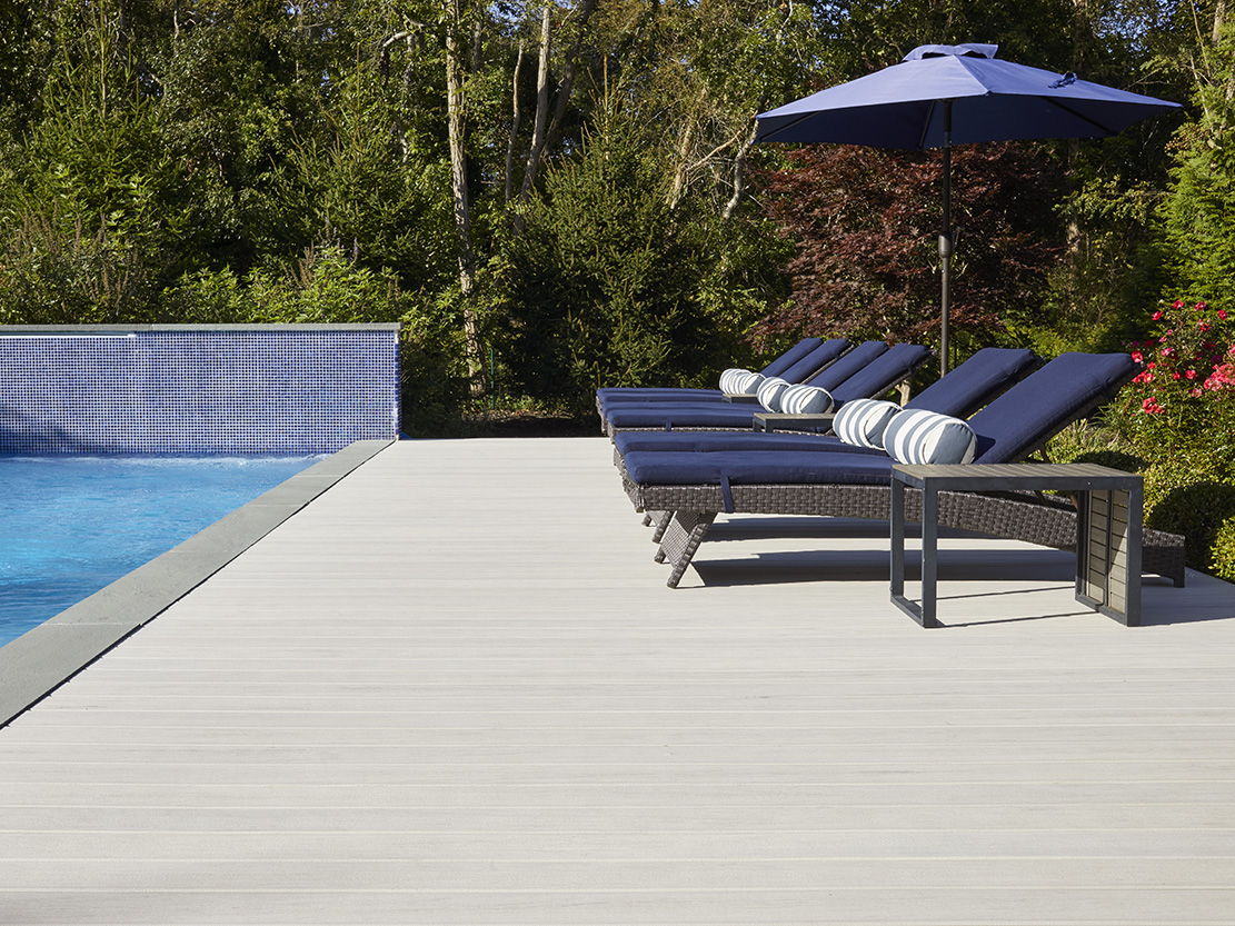 Light gray composite decking featuring TimberTech PRO Legacy Whitewash Cedar