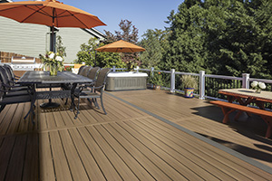 Installing composite decking over wood featuring TimberTech EDGE capped composite decking