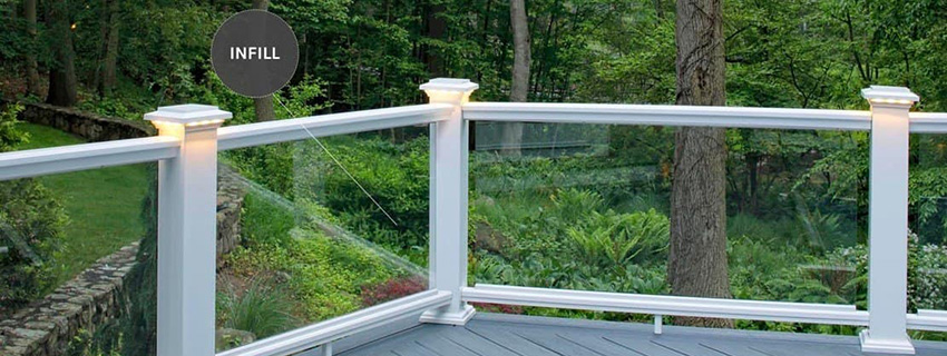 Deck railing ideas featuring composite railing and glass infill