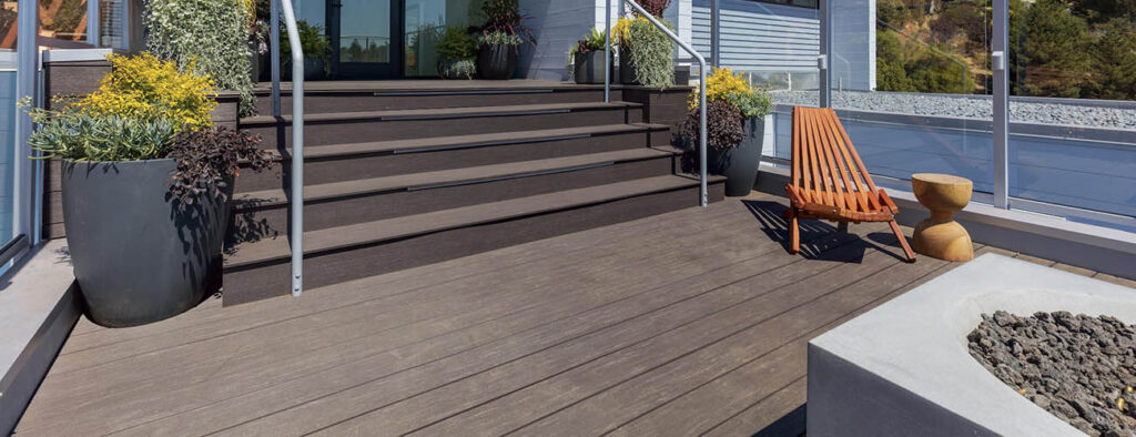 Deck Featuring TimberTech AZEK Vintage Collection in Dark Hickory with firepit