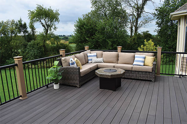 Deck featuring TimberTech AZEK Vintage Collection in Dark Hickory with outdoor furniture