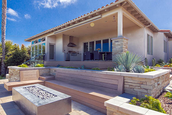 How to be more sustainable featuring TimberTech PRO Legacy Collection in Pecan Mediterranean style house