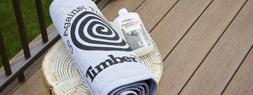 How to be more sustainable featuring TimberTech PRO Reserve Collection in Dark Roast towel with TimberTech logo