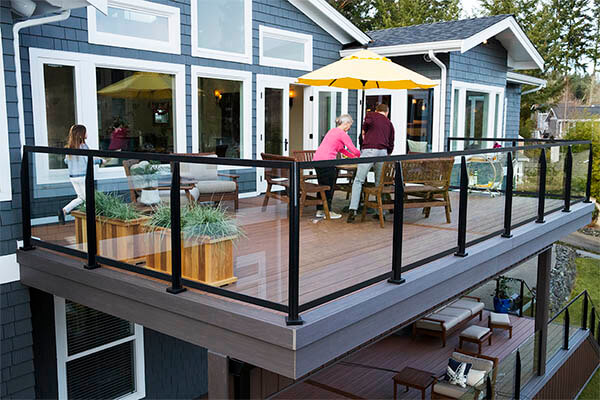 Picture frame composite deck featuring TimberTech AZEK Vintage Collection in Dark Hickory outdoor dining