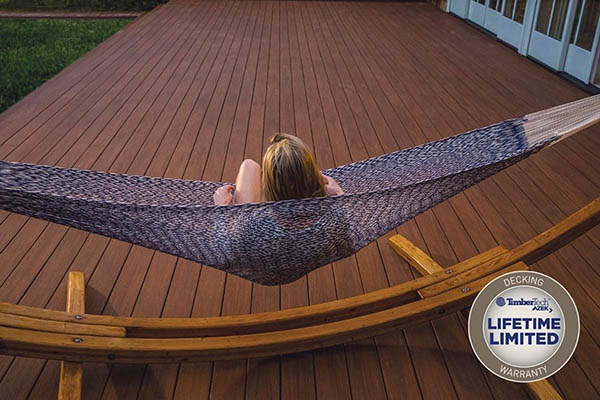 Recycled decking material featuring TimberTech AZEK Vintage Collection in English Walnut with hammock