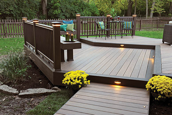 Multi-level deck featuring TimberTech PRO Legacy Collection in Tigerwood with Mocha Accents and stair riser lights