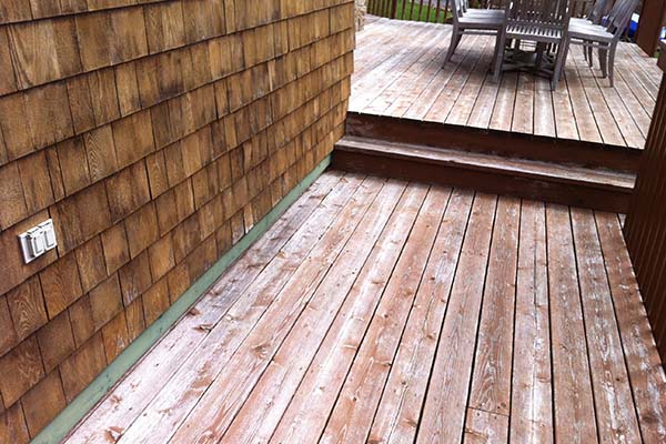 Wood deck showing fading and weathering