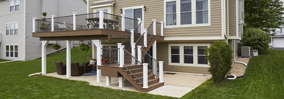 Second-story deck features stairs with a landing