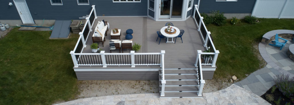 Deck board spacing between deck boards aerial view of backyard deck