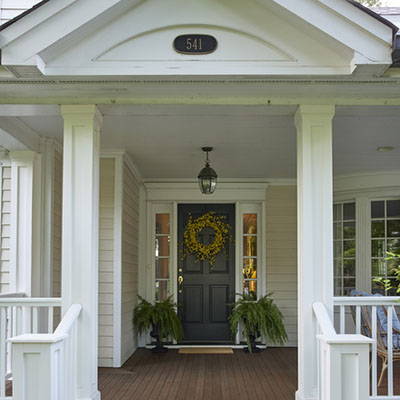 Covered front porch ideas featuring traditional millwork