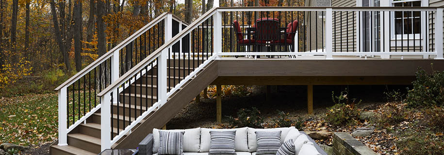 Deck-Stairs-TimberTech-PRO-ReserveCollection-Pecan-ClassicCompositeSeries-White-DrinkRail Deck stairs design is affect by deck shape and height
