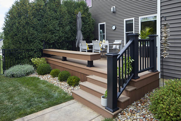 Landscaping around a deck doubles as a privacy screen