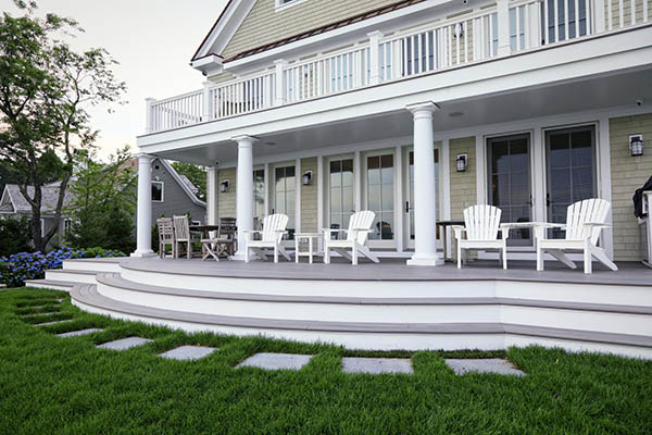 Under deck ideas featuring wraparound stairs