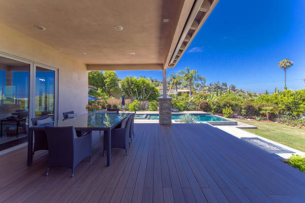 Partially covered deck ideas on shady furnished poolside covered deck