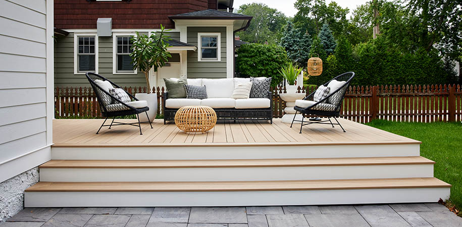 How to plan a deck project featuring TimberTech AZEK Weather Teak furnished outdoor deck