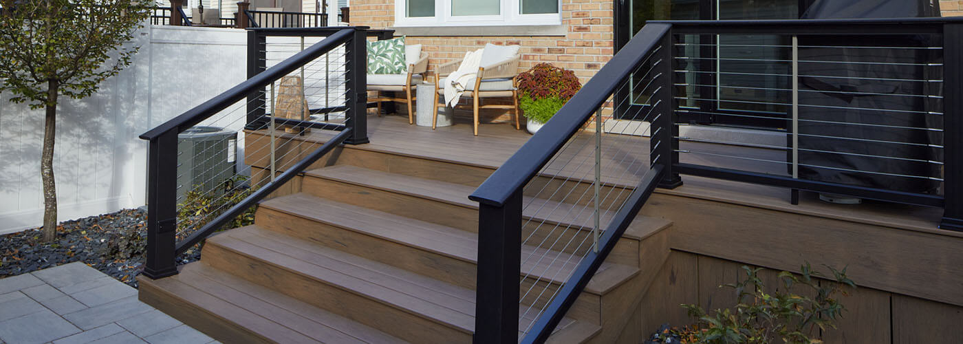 Deck railing ideas and deck baluster ideas for backyard stairs on furnished porch