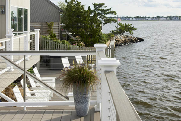 Outdoor fall activities at home on lakeside deck with planter