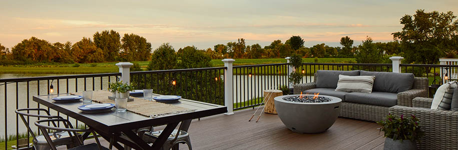 Outdoor fall activities at home on lakeside deck with firepit