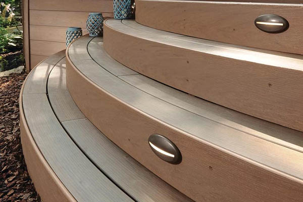 Two tone deck color schemes with rounded deck stairs featuring decorative cups and risers