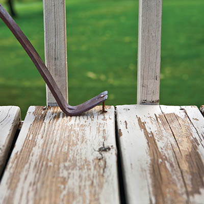Rusted or loose fasteners may indicate DIY deck replacement
