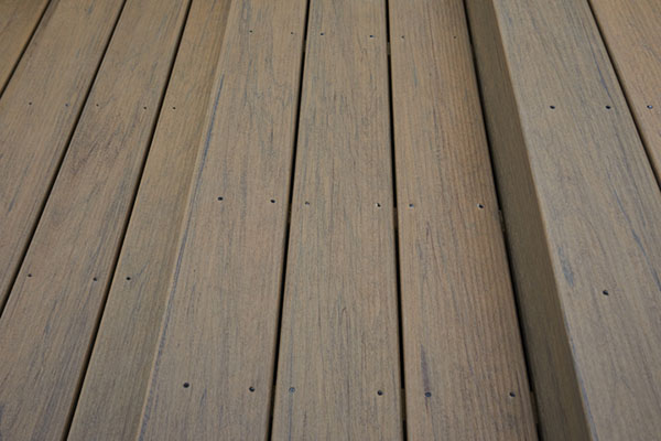 Choose square-shoulder over grooved composite decking for top-down fasteners