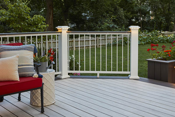 Modern backyard ideas include deck lights for a warm glow